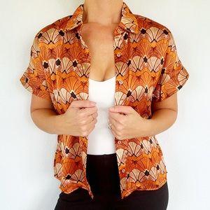Anthropologie Bailey 44 orange satin abstract short sleeve button down small